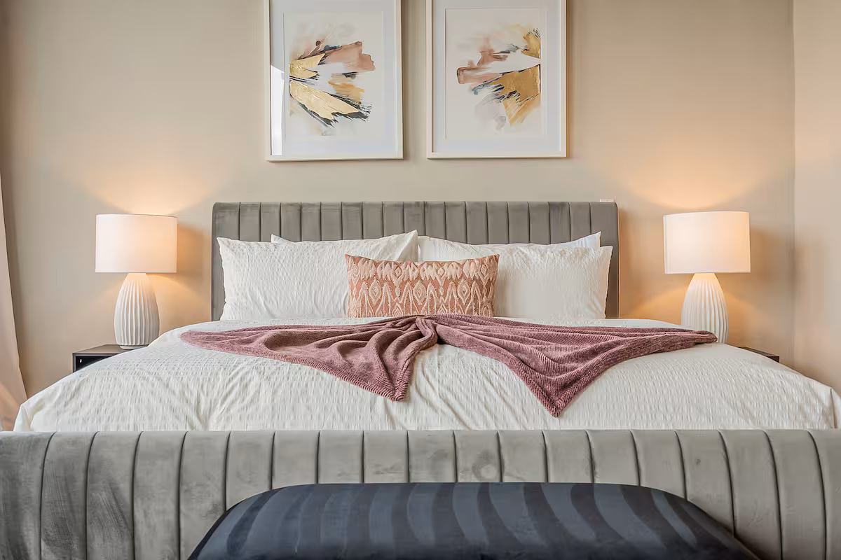 Comfortable bedroom with natural light and peaceful atmosphere