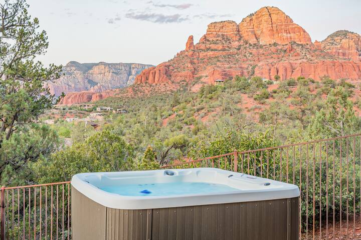 Luxurious hot tub with stunning red rock formations backdrop